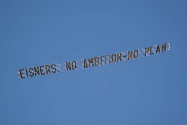 Pompey fans remain split over protests against Michael Eisner.