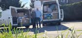 Paul Mann and Rupert Wright prepare to take donations to a refugee camp in Poland
