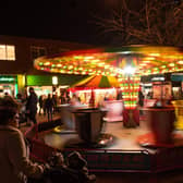 One of the fairground rides in motion at a previous Waterlooville event. Picture: Vernon Nash (180685-016)