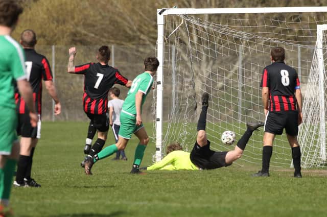 Ash Wheatley (7) nets Carberry's opening goal against Cowplain. Pic: Kevin Shipp.