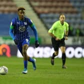 Former Pompey favourite Jamal Lowe was the hero for Wigan upon the resumption of the Championship. Picture: Charlotte Tattersall/Getty Images