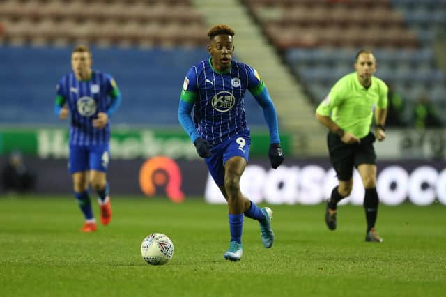 Former Pompey favourite Jamal Lowe was the hero for Wigan upon the resumption of the Championship. Picture: Charlotte Tattersall/Getty Images