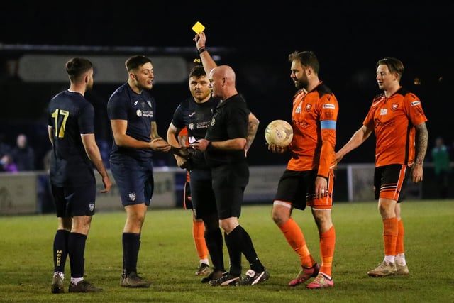 A  Hamble player is booked. Picture: Nathan Lipsham