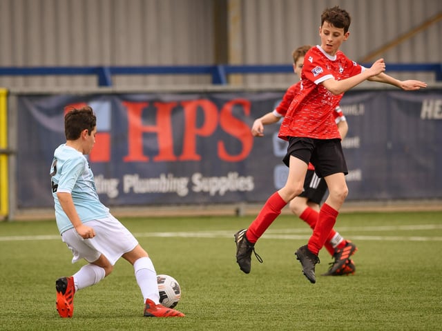 Action from the Portsmouth Youth League Geldard Invitation Cup final between Jubilee 77 U13s and Castle United U13s (light blue and white kit). Picture: Keith Woodland (190321-435)