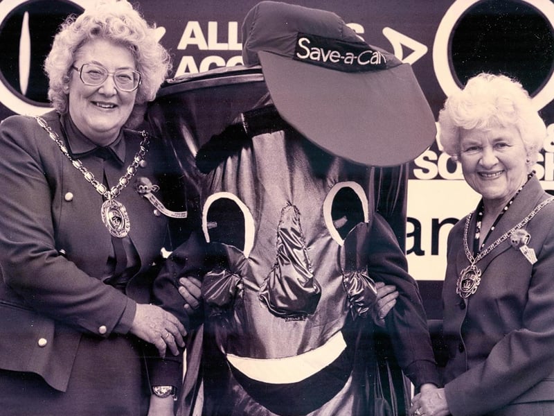 The Mayor of Fareham Dorrine Burton-Jenkins, loeft, and the Mayoress Megan Chapman with Uplands Primary School pupil Katie Gardner launching the Save-a-can initiative in May 1993. The News PP134