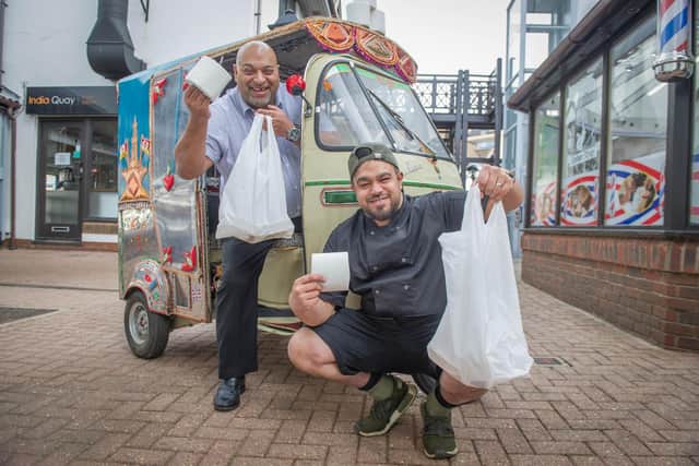 Management team, Sonny Ahmed and Ishy Ahmed ready to deliver food and toilet rolls in their Tuk Tuk outside India Quay, Port Solent.

Picture: Habibur Rahman