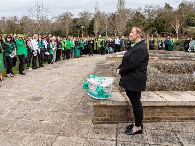 Attendees assemble for the release of five white doves at the funeral of baby Jax. Picture: Mike Cooter (160324)