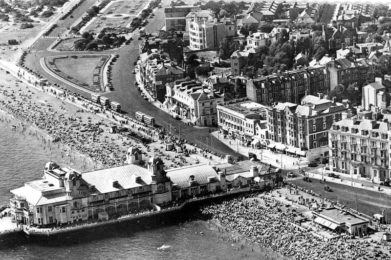 Southsea beach showing South Parade Pier before it was destroyed by fire, and the very crowded beach taken in late 1940's.