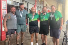 Portsmouth friends Matt Burnett, Sonny Dobson, Sam Sargeant, Shaun Legg and Dave Pike cross the London to Brighton cycle ride finish line in September.