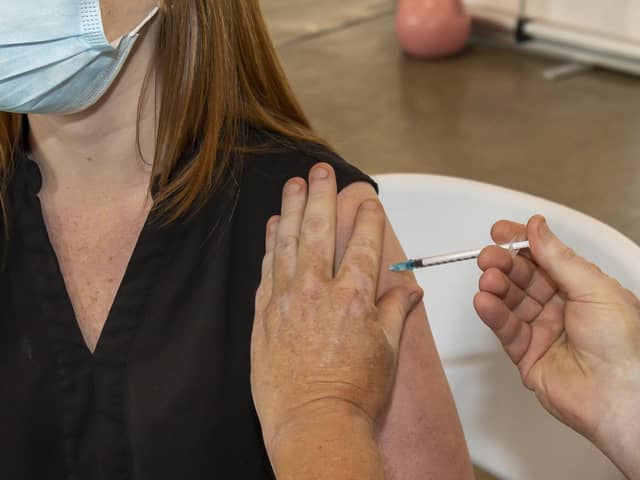 A jab being given at Cosham fire station in summer 2021 Picture: Mike Cooter (300721)