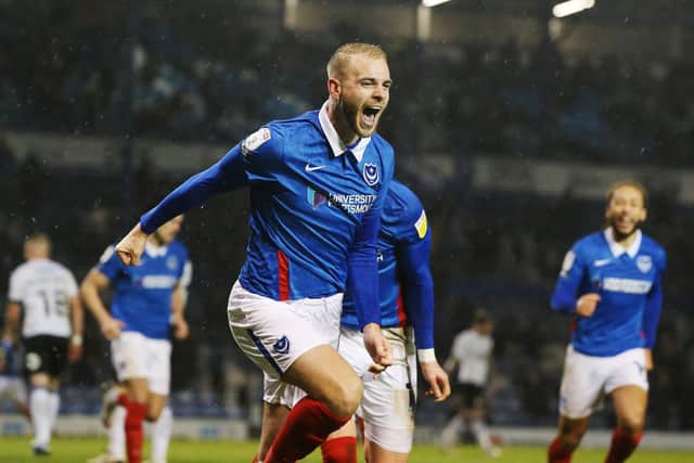 Jack Whatmough celebrates his first goal at Fratton Park as fans returned today