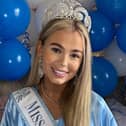 Cerys wearing her sash.