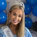 Cerys wearing her sash.