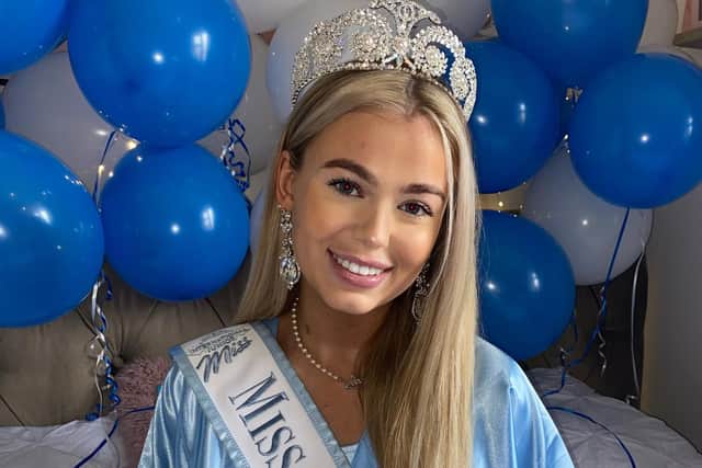 Cerys wearing her sash.