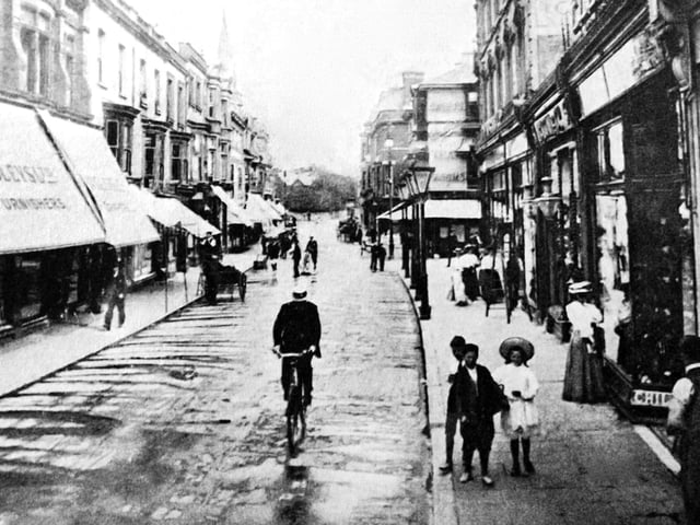 Edwardian Palmerston Road. All of what you see was destroyed in the blitz of January 10, 1941. The road has just be cleaned by a water cart.
