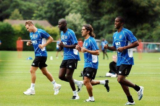 Matt Taylor, Djimi Traore, Pedro Mendes and Sylvain Distin is pre-season training in July 2007. Picture: Steve Reid
