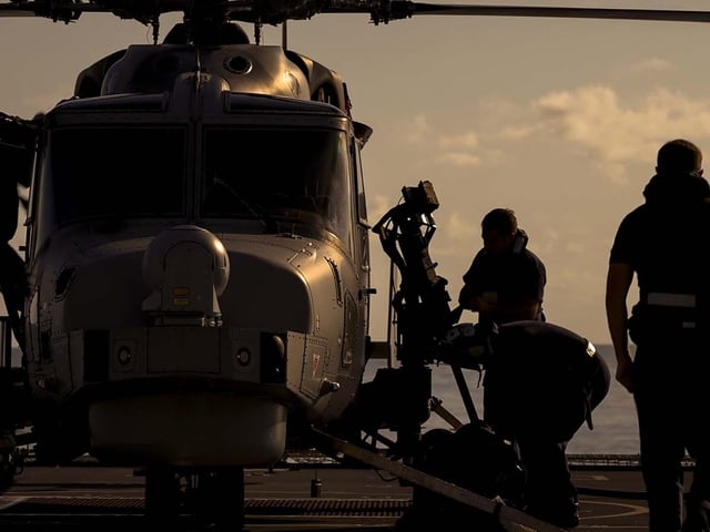HMS Dauntless conducting a drugs intervention/rescue mission whilst operating in the Caribbean region.