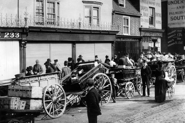 1892:  A street in Southsea, Portsmouth.  (Photo by F J Mortimer/Hulton Archive/Getty Images)