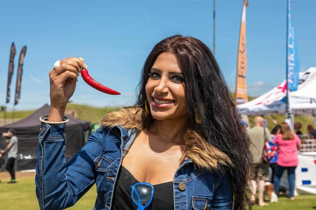 Shahina Waseem, the Chilli Queen, at the Portsmouth Chilli and Gin Festival. Picture: Mike Cooter (220522)