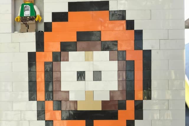 Lego mosaics of South Park and Pacman characters have been appearing across Gosport High Street. Pictured is Kenny McCormick from South Park. Picture: Mark Shakespeare.