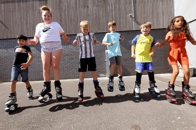 Pictured is: Having fun on the jumping boots.
Picture: Chris Moorhouse (020923-4073)