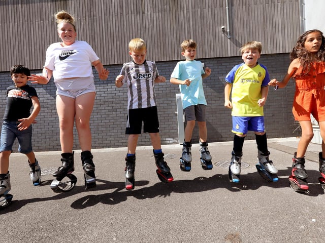 Pictured is: Having fun on the jumping boots.
Picture: Chris Moorhouse (020923-4073)