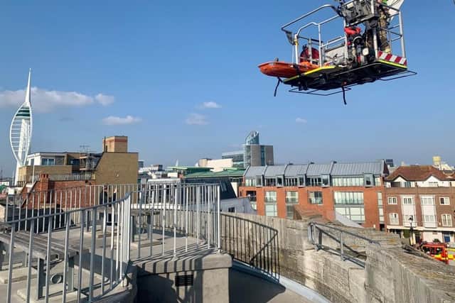 Firefighters rescue person from Hot Walls roof in Old Portsmouth. Pic Hants fire and rescue service/Twitter