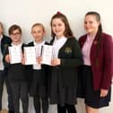Winning team members, Sophie Ryder, Molly Bevis, Grace Morgan and Isabel Pym with Year 10 pupil, Daisy Crane.