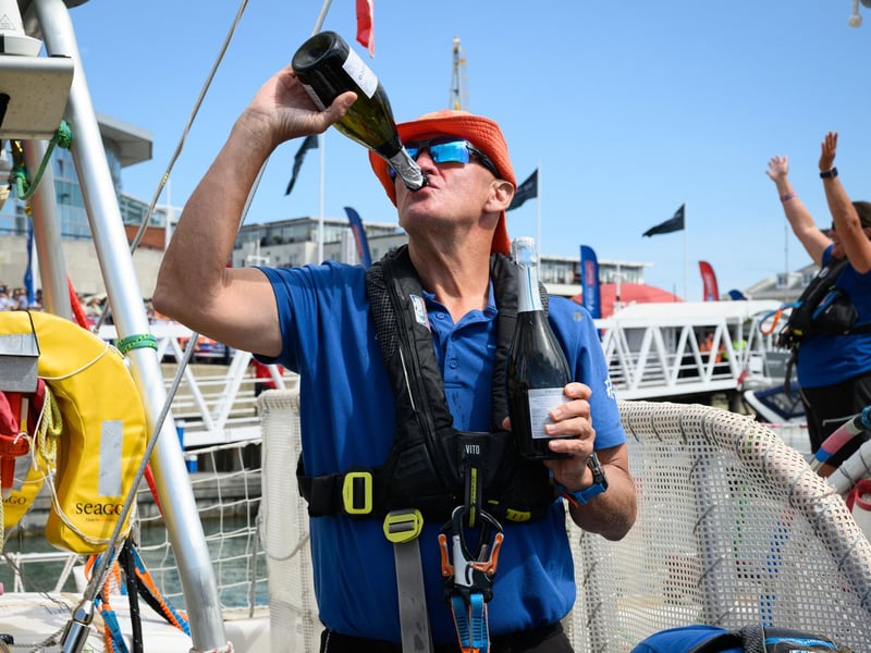 A Zhuhai crew member enjoys a well earned drink (or two)Picture: Keith Woodland (270721-46)