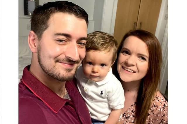 Rachel and Jack Linter praised the 'incredible' and 'emotional' tribute for their son Maximus who passed away. The minute's applause was held at Portsmouth's match against Lincoln City on Saturday. Picture: Jack, 20-month-old Zachary, and Rachel.