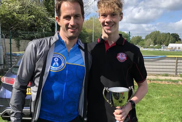 Sam Cooper pictured with Olympic sailing legend Sir Ben Ainslie after winning a Portsmouth City Council young sportsman of the year trophy