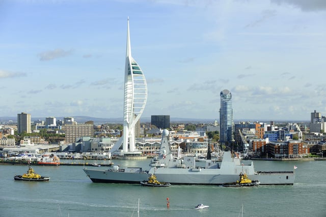 30th October 2012. HMS Dauntless arrives back in Portsmouth to a typically warm welcome from those on the shore-line and families on the quayside 
Picture: Malcolm Wells (123530-1073)