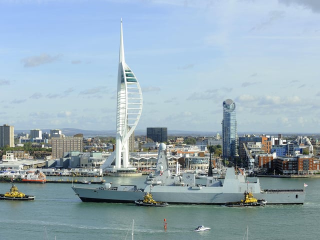 30th October 2012. HMS Dauntless arrives back in Portsmouth to a typically warm welcome from those on the shore-line and families on the quayside
Picture: Malcolm Wells (123530-1073)