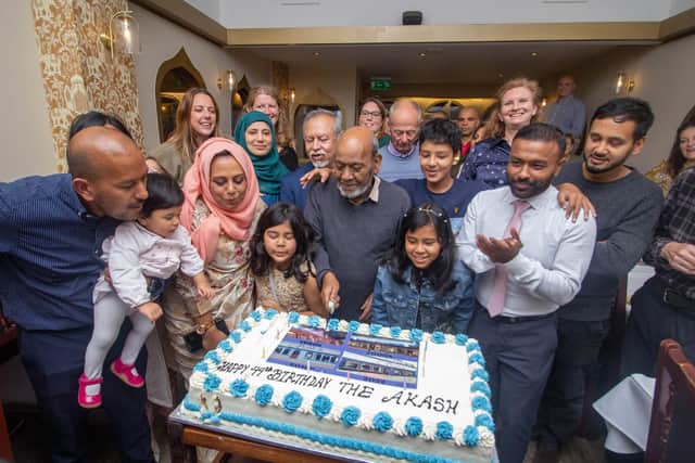 The Ahmed family and guests marking The Akash's 44th birthday by cutting a cake. Picture: Habibur Rahman