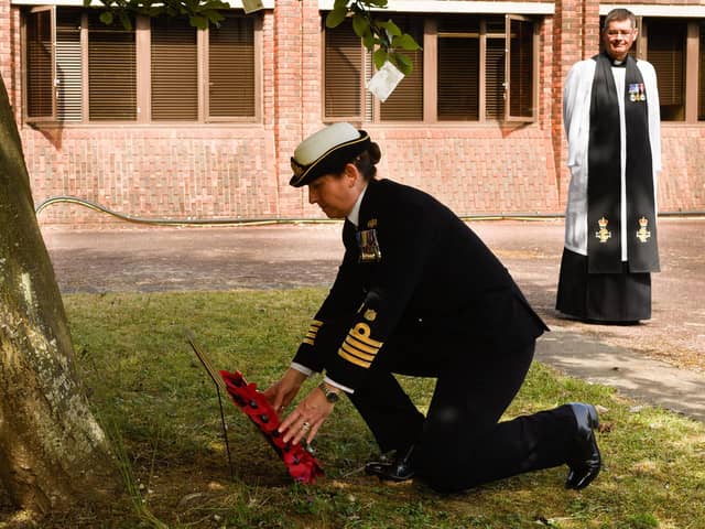 Commanding Officer Captain Catherine Jordan laid a wreath while Reverend
Jonathan Backhouse looked on.