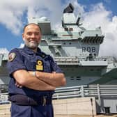 Commodore Steve Moorhouse, commander of CSG21, in front of HMS Queen Elizabeth.

Picture: Habibur Rahman