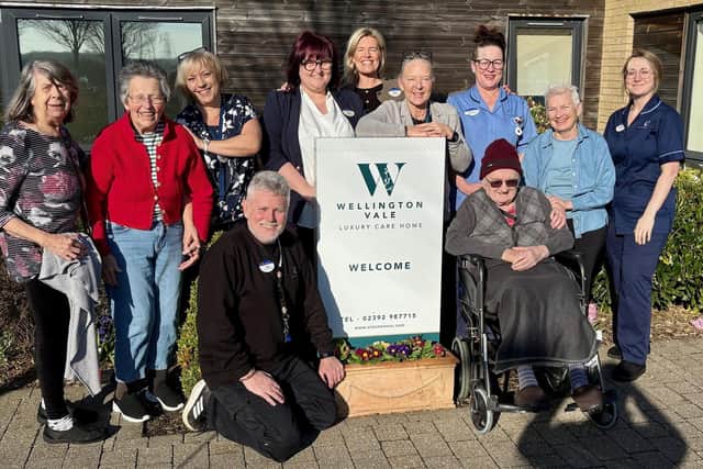 Staff and residents at Wellington Vale celebrate the care home being selected as a top 20 care home in the South East of England