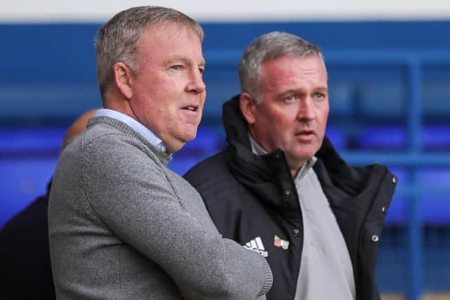 Pompey boss Kenny Jackett and Ipswich manager Paul Lambert. Picture: Nigel Keene