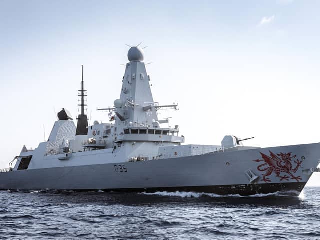 Photograph of HMS Dragon at sea.