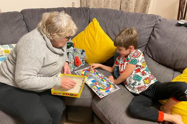 Mengham Infant School have started a board game club and board game rental.
Pictured: Oliver and his Nanny playing Monza after renting it.