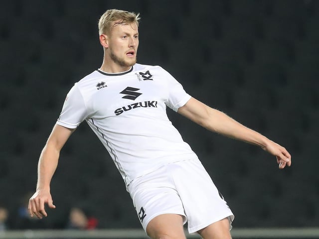After impressive performances at the centre of defence last season, the 22-year-old has attracted strong interest from the Championship. A key figure in the Dons’ back line could depart this summer with Russell Martin keen to sign his former centre-back at Swansea. The defender netted 10 times in 44 outings from defence, helping Manning's side reach the play-offs.