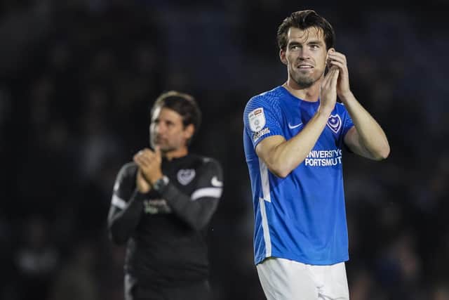 Pompey striker John Marquis with head coach Danny Cowley in the background. Picture: Jason Brown