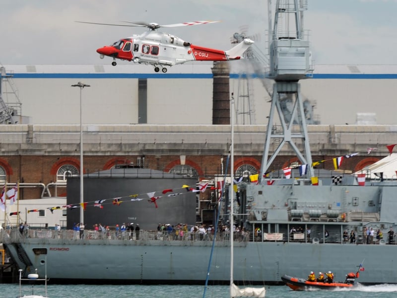 Navy Days at the Portsmouth Naval Base. The Coastguard Helicopter display over HMS Richmond 31st July 2010. Picture: Paul Jacobs 102433-24