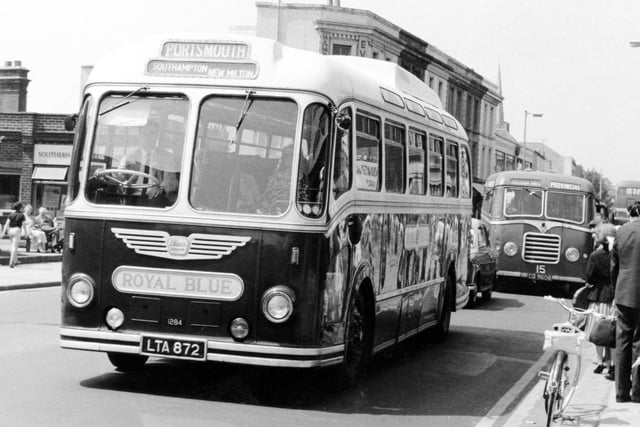 A 32-year-old Provincial single decker in the background. The Royal Blue coach is en route to Portsmouth from Bournemouth via Southampton and New Milton on the famous South Coast Express service. Taken June 1, 1966, in West Street, Fareham, when it was the A27.