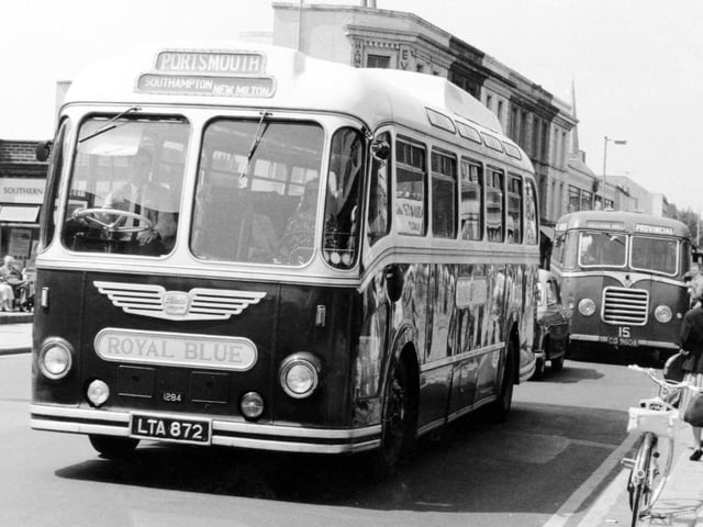 A 32-year-old Provincial single decker in the background. The Royal Blue coach is en route to Portsmouth from Bournemouth via Southampton and New Milton on the famous South Coast Express service. Taken June 1, 1966, in West Street, Fareham, when it was the A27.