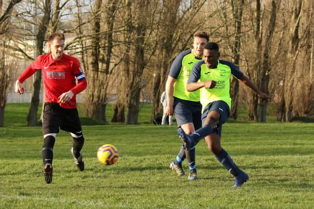 Nigel Mayo scores Harvest Home's second goal in a victory over Wymering. Picture: Kevin Shipp