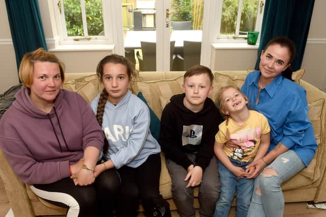 Ukranian refugees who are staying with a family in Sarisbury Green,

Pictured is: (left) Olha Sukhovii with her daughter (second left) Yevheniia Hlotova (9) and (right) Yuliia Beresneva with her children Danylo (10) and Anna (5).

Picture: Sarah Standing (200522-7860)