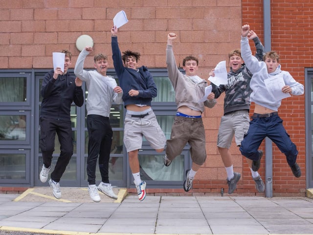 Students jump for joy at their GCSE results at Miltoncross Academy, PortsmouthPicture: Habibur Rahman