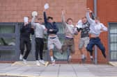 Students jump for joy at their GCSE results at Miltoncross Academy, PortsmouthPicture: Habibur Rahman