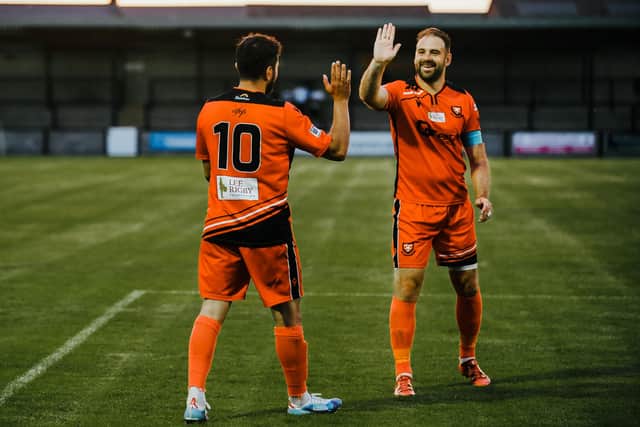 Brett Pitman, right, during Portchester's friendly win at Dorchester. Picture by Daniel Haswell